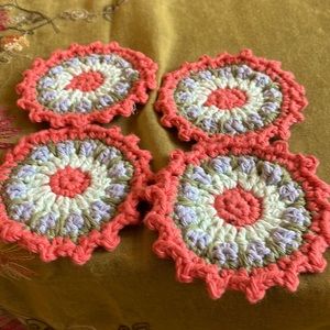 Hand crocheted Mandala coasters in apricot, blue, green, mint
